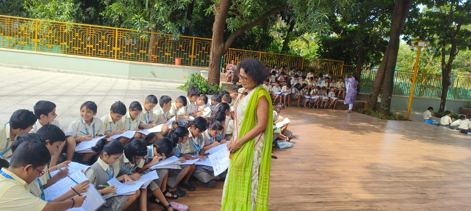 Std 3 A B C - An outdoor science activity in the Gurukul to promote the experiential learning and observation skills .