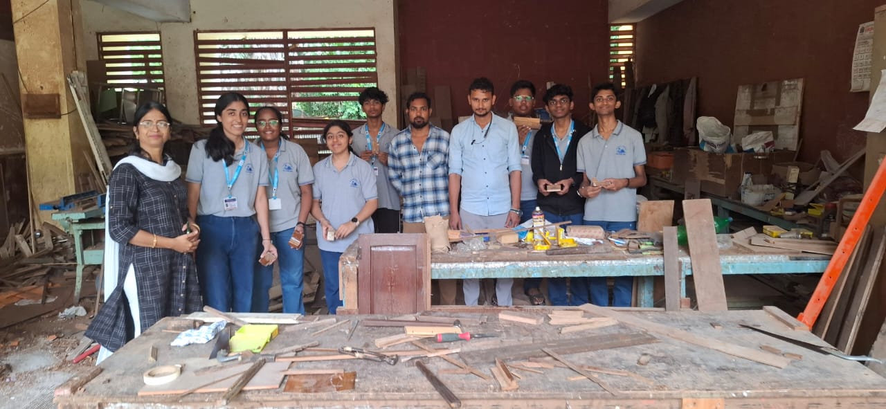 Std. XI students visited the school carpentry lab for a Engineering Graphics activity based on orthographic projection of machine blocks.