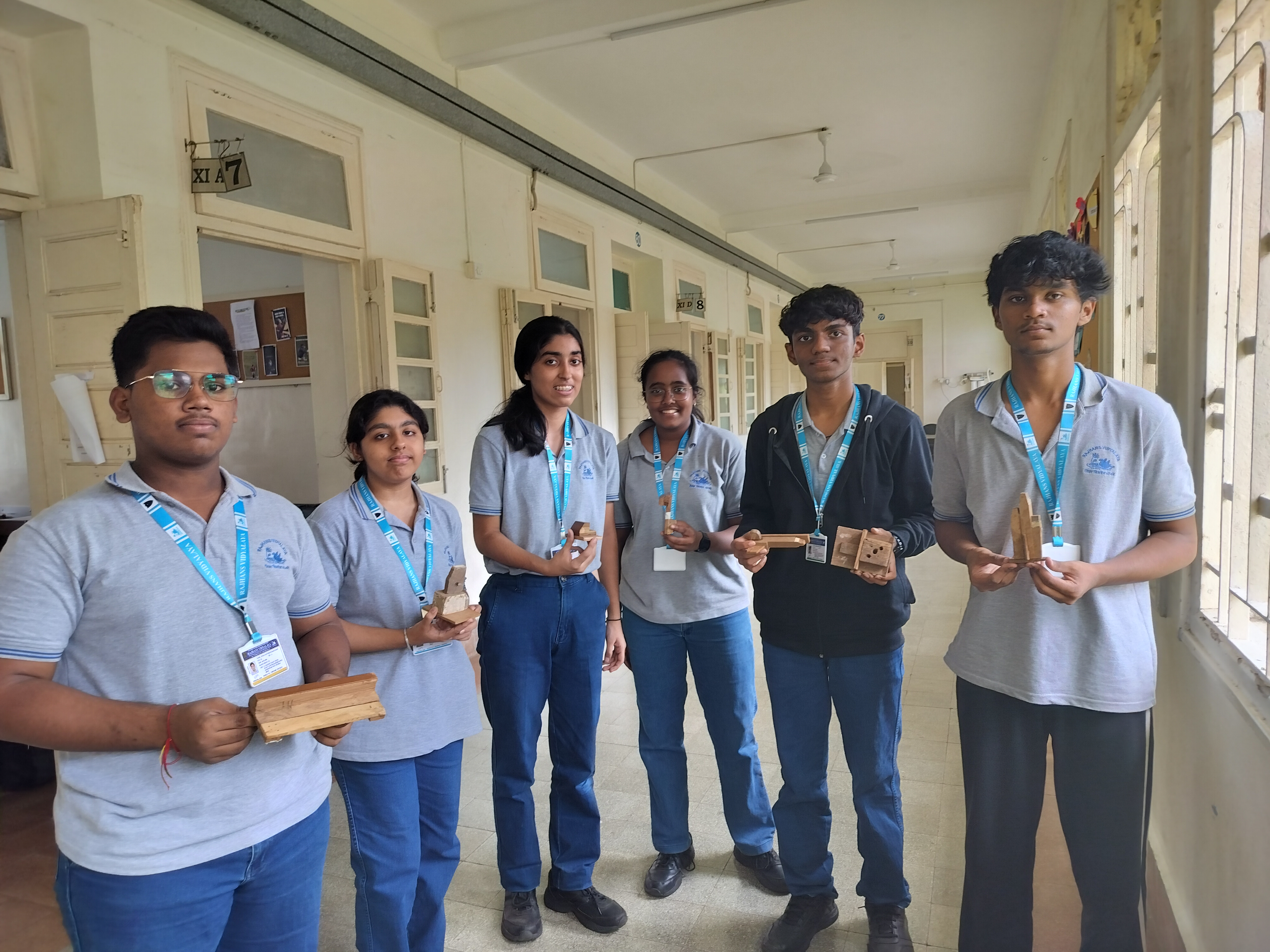 Std. XI students visited the school carpentry lab for a Engineering Graphics activity based on orthographic projection of machine blocks.